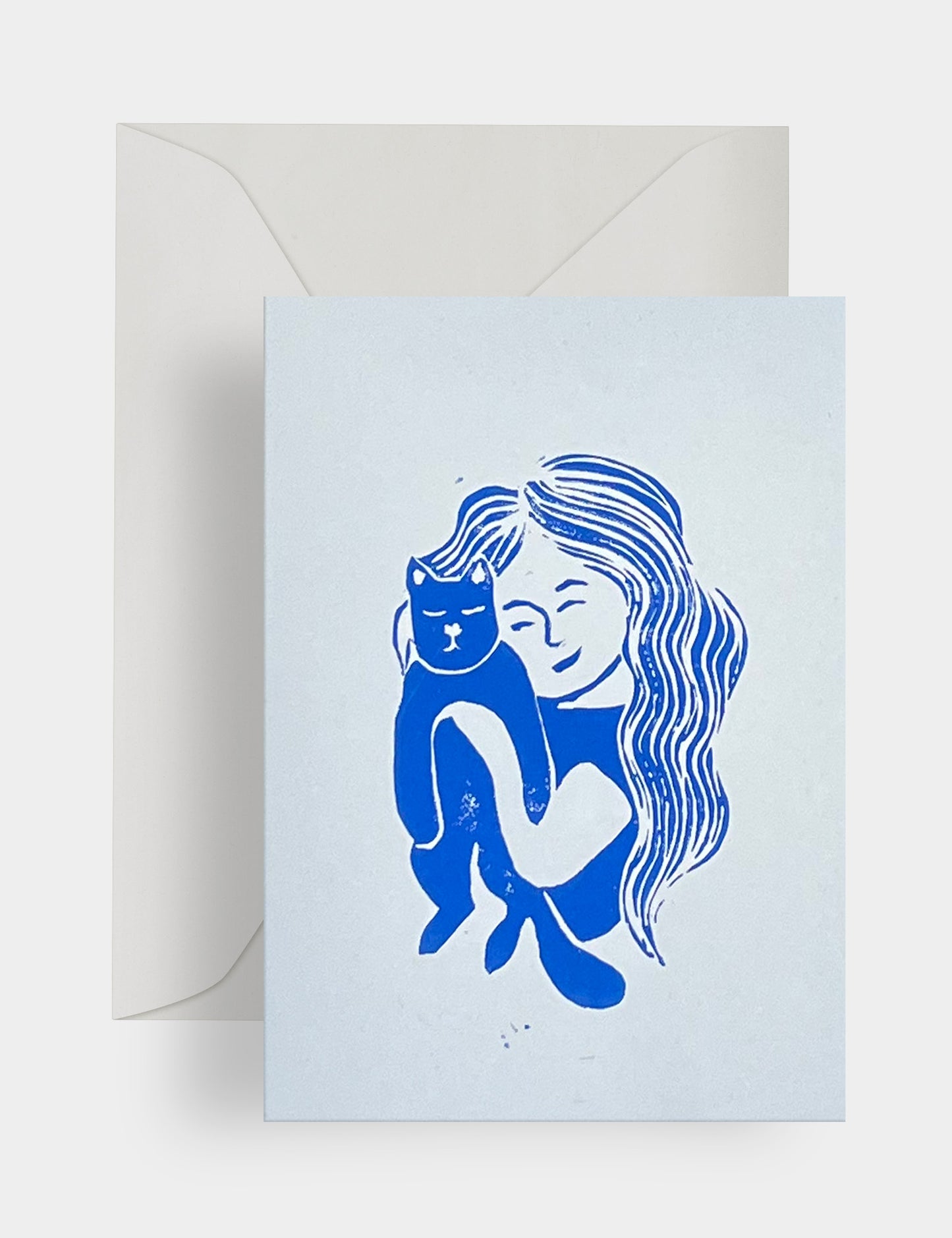 Girl holding cat - Linoleum print